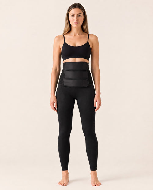 MADRE Restore Legging postpartum compression leggings with built-in adjustable belly band, front view on model in black